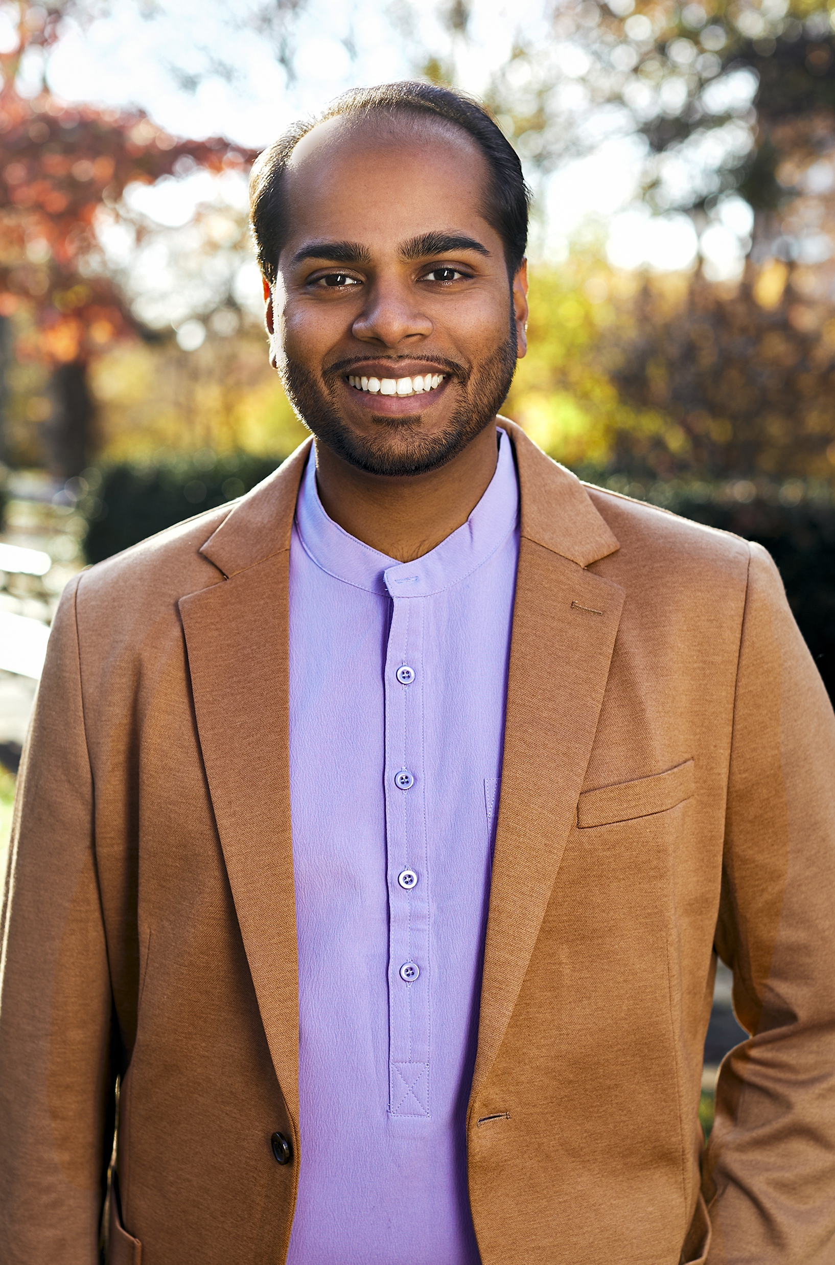 Modern corporate headshot with neutral tones
